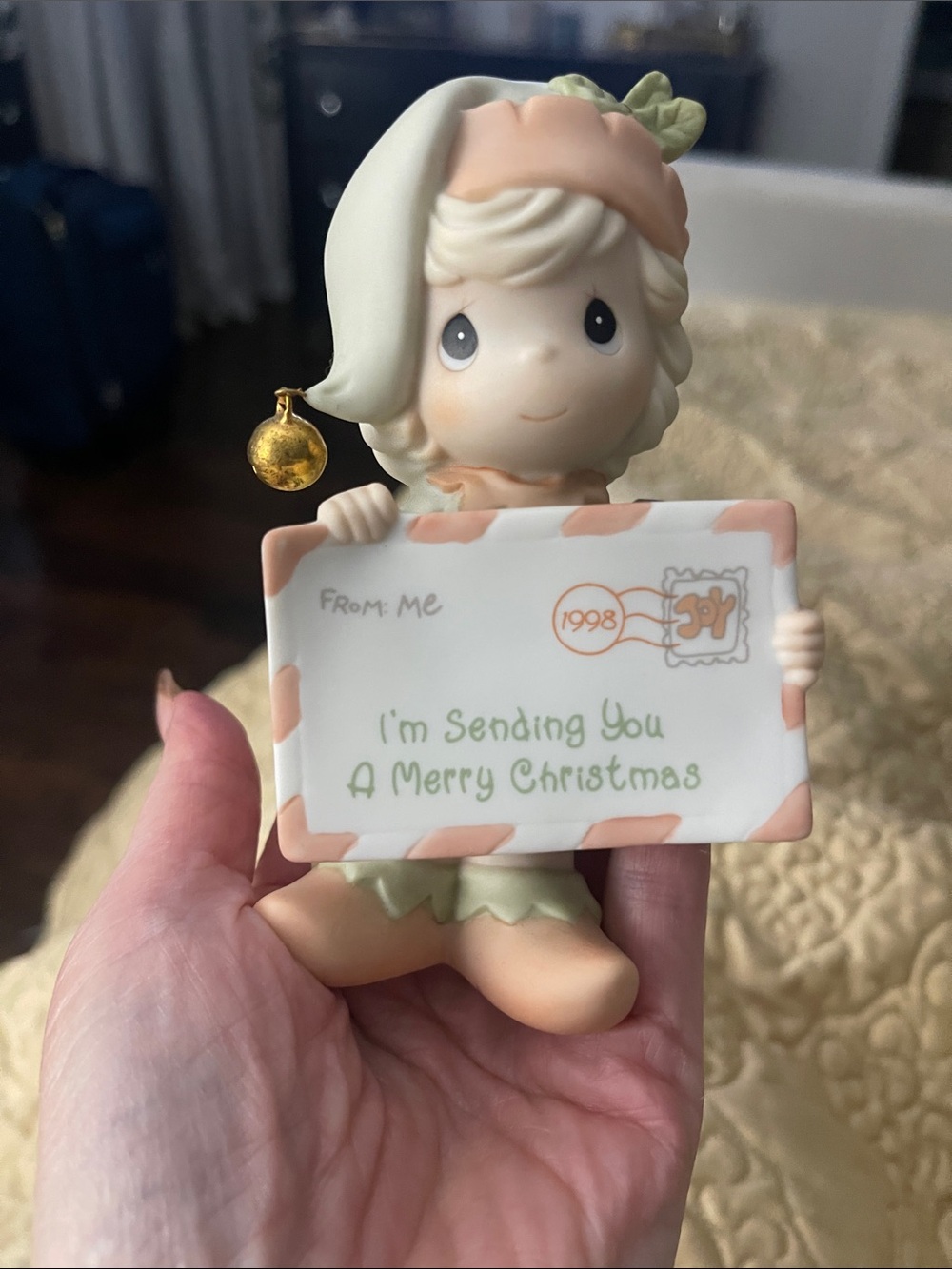 Precious Moments Peach, Cream & Green Holiday Figurine Holding Christmas Card
